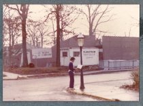 Woman across from library construction
